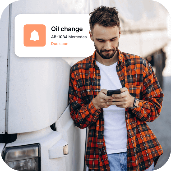 A photo of a person checking out Mapon fleet management tracking system on his phone. The "Oil Change" notification is visible.