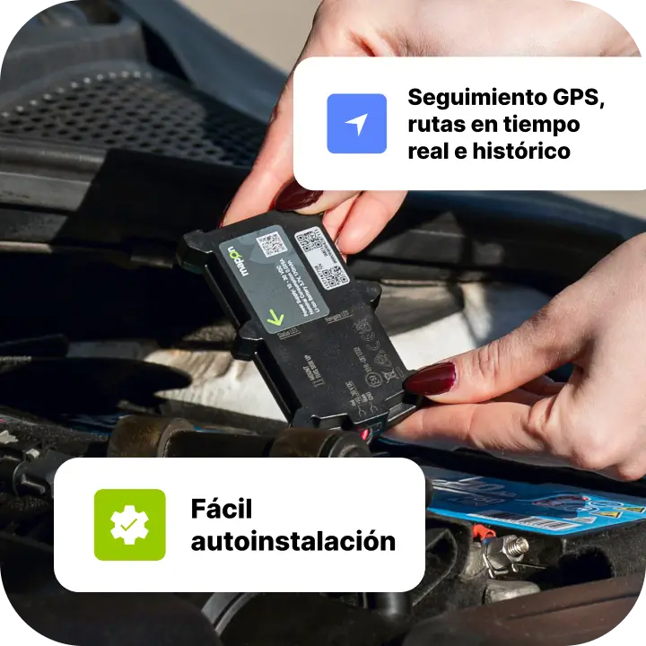 Un gestor de flota instalando el dispositivo de seguimiento Mapon Basic en un coche.